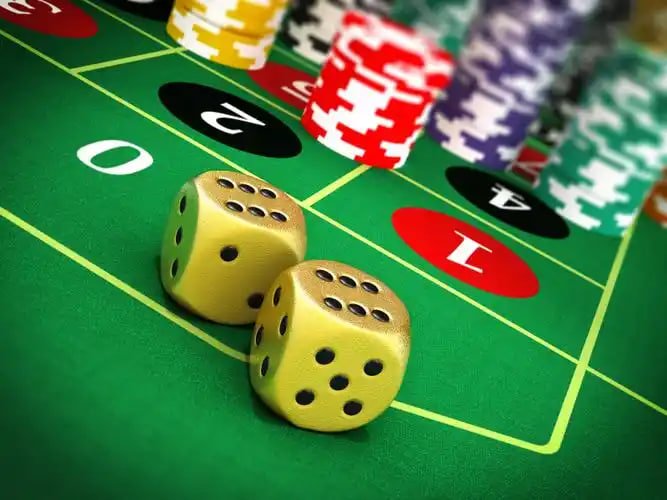 Casino game lobby showing slot machine reels and card game options on screen